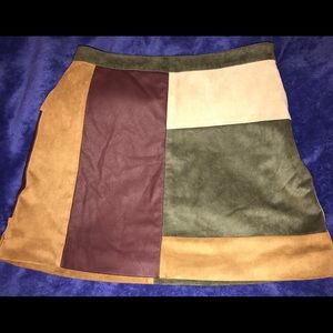 Faux leather and suede color block mini skirt